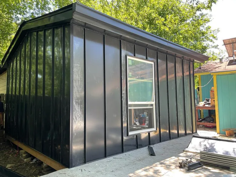 Black standing seam metal wall panels for Metal Roof Installation in Villa Rica